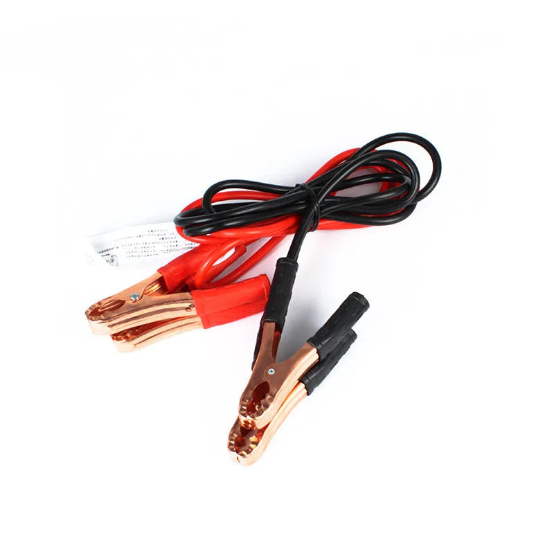 Black and red car battery jumper cables with clips for emergency vehicle jump-starting