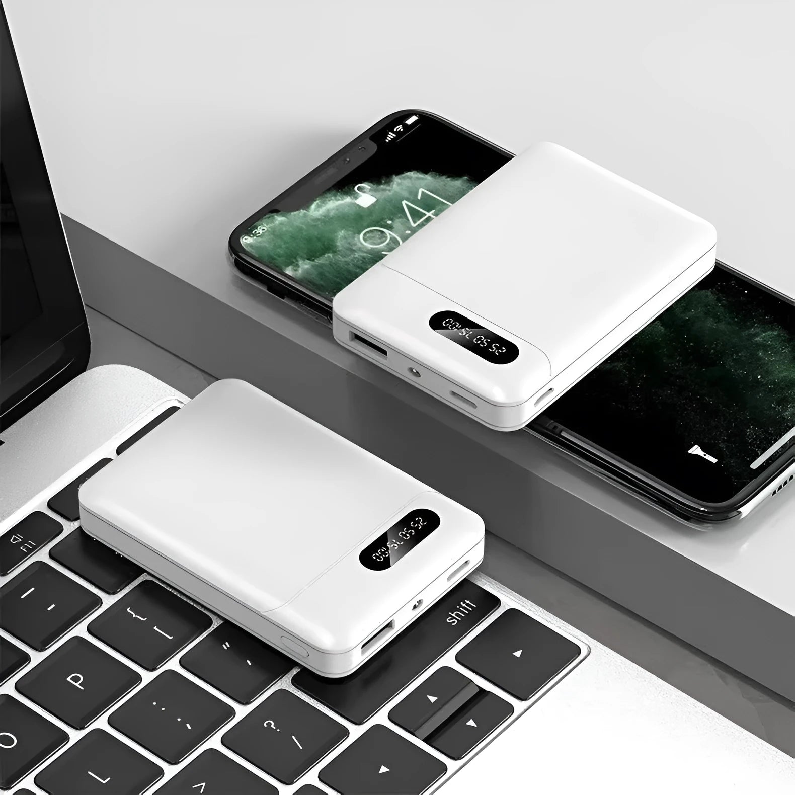 White or black portable power bank with multiple USB ports, showing compact 92mm x 63mm size.