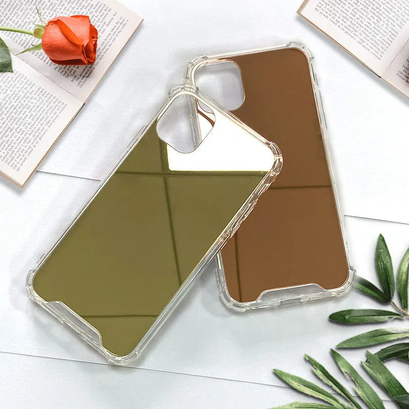 Silver mirror finish hard PC phone case for Apple iPhone on a table.