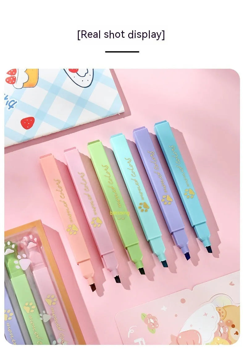 Cat's Paw fluorescent marking pen set showing six pens with oblique heads in a plastic box.