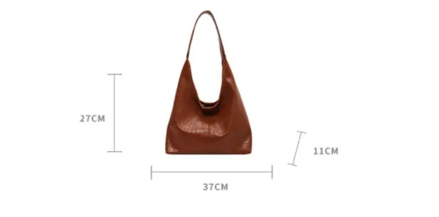 Soft PU leather shoulder bag with sewing thread accents and sandwich pocket design