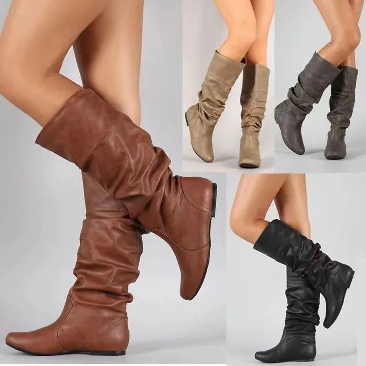Women's slip-on knee high flat boots in artificial PU upper with round toe and rubber sole