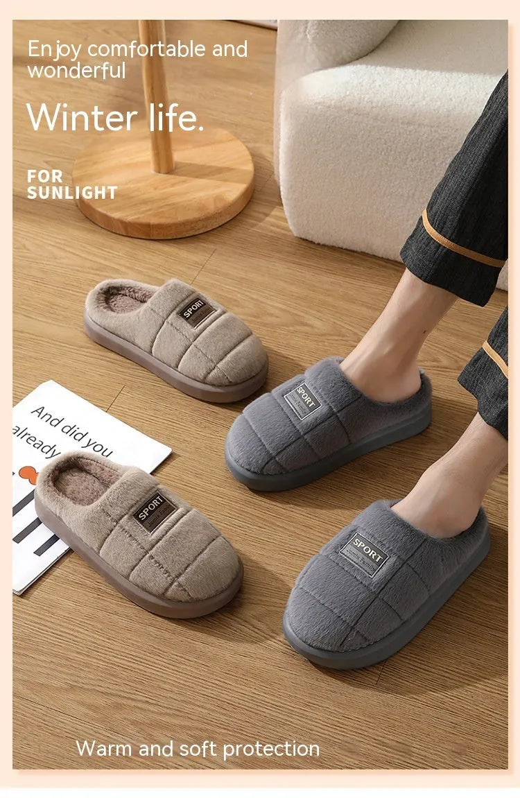 Men's grey thick-soled winter slippers with rabbit hair upper and textured sole.