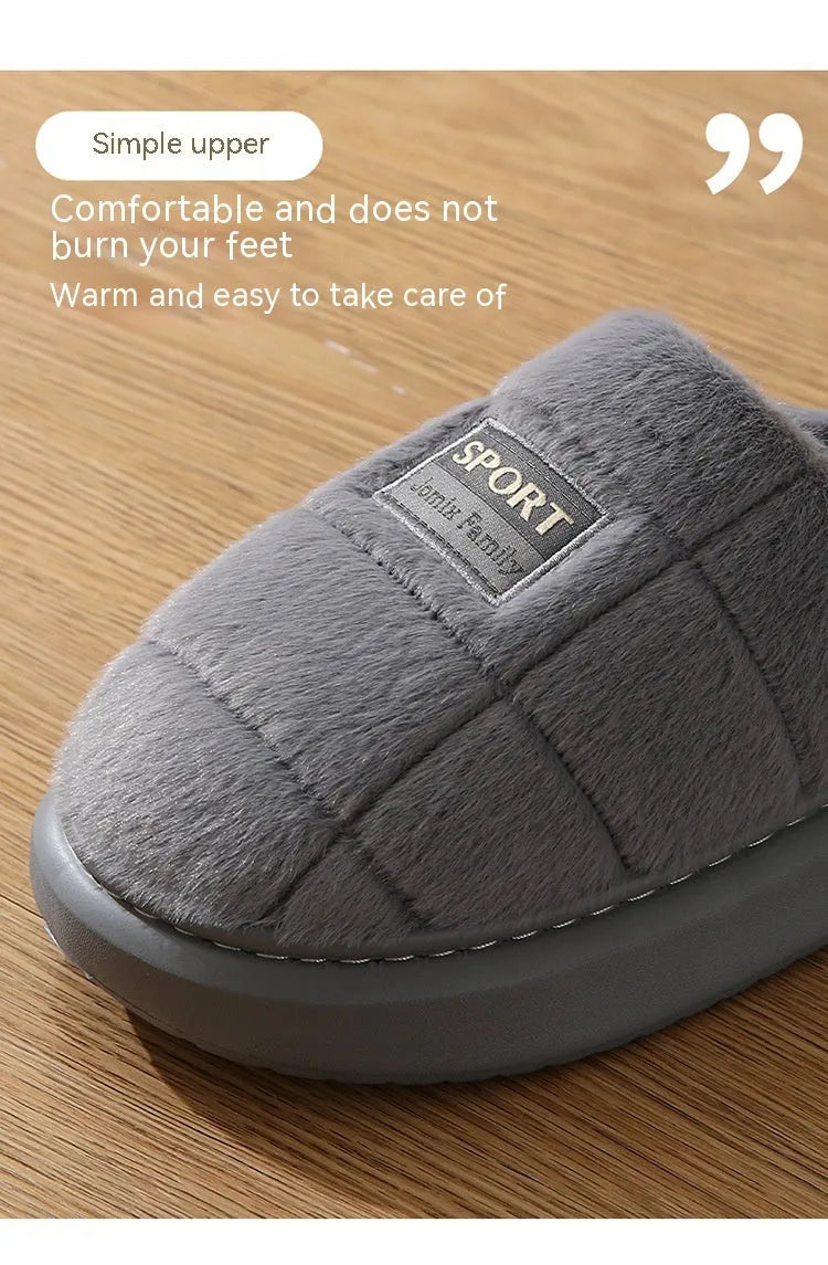 Men's grey thick-soled winter slippers with rabbit hair upper and textured sole.