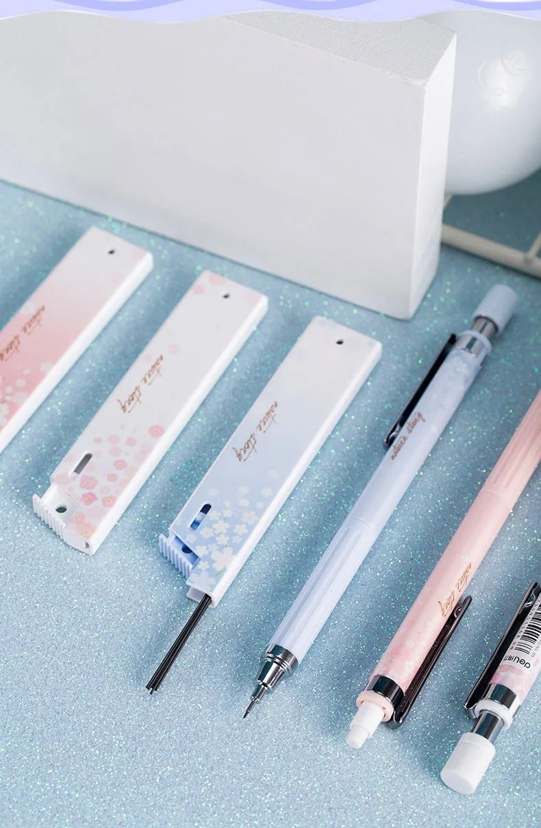Cartoon automatic pencil set containing three propelling pencils and three HB refill boxes