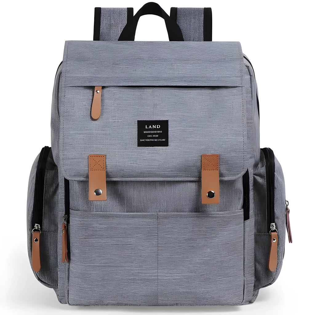 LAND Mommy large grey diaper backpack with multiple compartments and a changing mat laid out