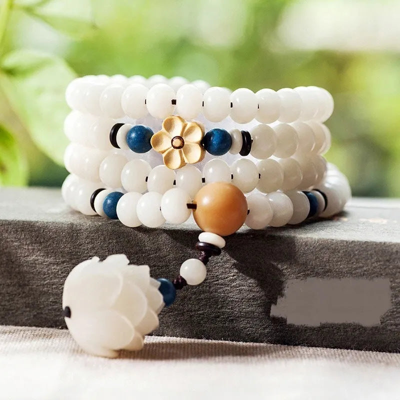 White jade Bodhi bead bracelet with 6x8mm beads in multiple design styles