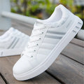 Unisex black, grey and white sports shoes with lace-up front in EU sizes 39 to 44