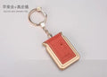 Bluetooth dual SIM adapter keychain for iOS phones with leather casing options