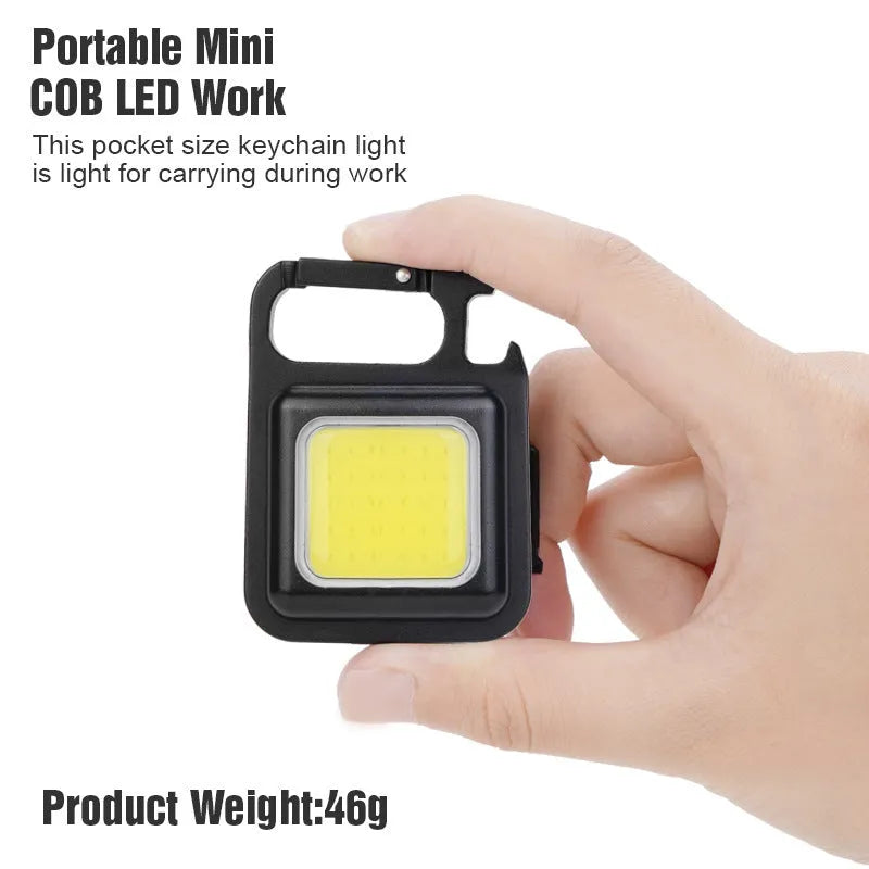 Black aluminium alloy USB rechargeable keychain torch with magnetic base and foldable handle