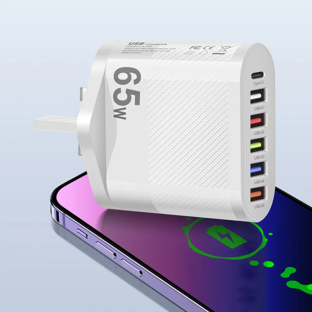 White mobile charging plug showing USB port and international adapter interfaces