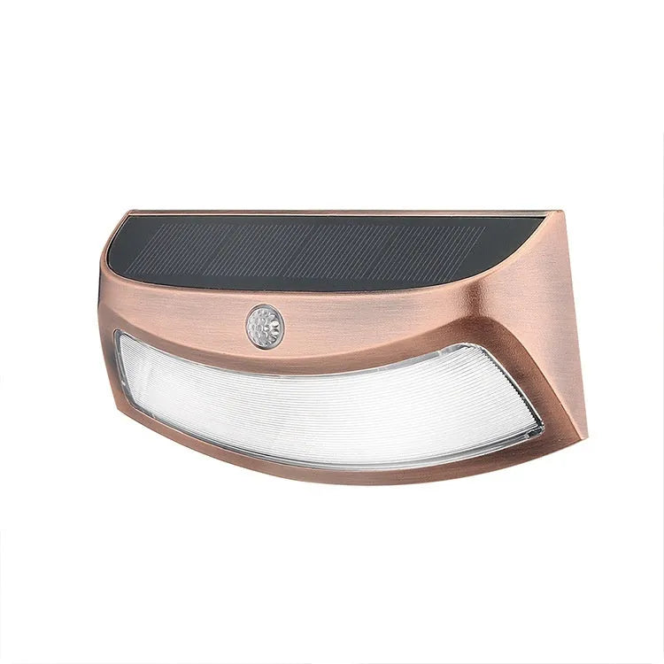 Solar outdoor wall light with smiling face design and IP65 waterproof rating