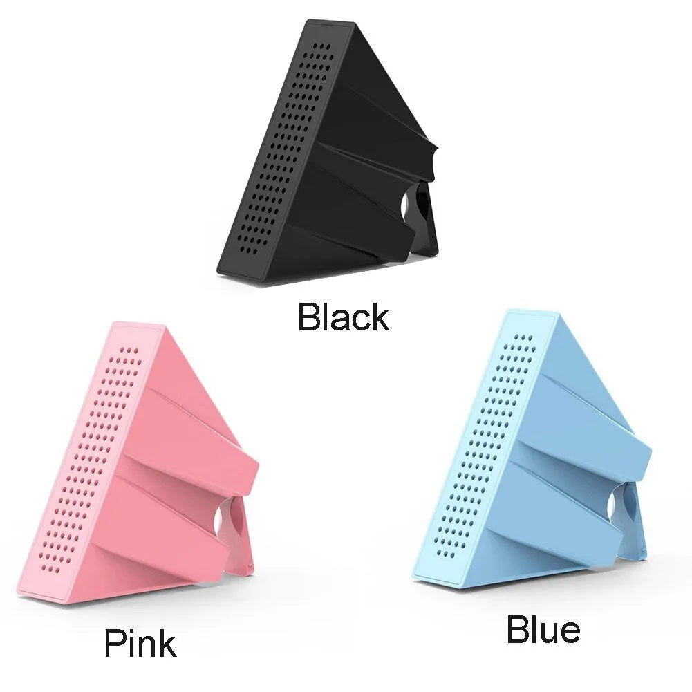 A portable black ABS plastic mobile phone amplifier bracket holding an iPhone.