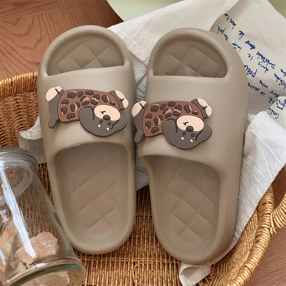 Pair of EVA flip flop sandals for couples in leopard puppy print, showing thickened sole.