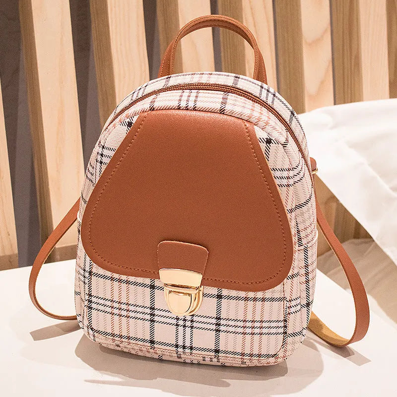 A one-shoulder diagonal phone bag made from PU fabric, shown in one of five colour options.