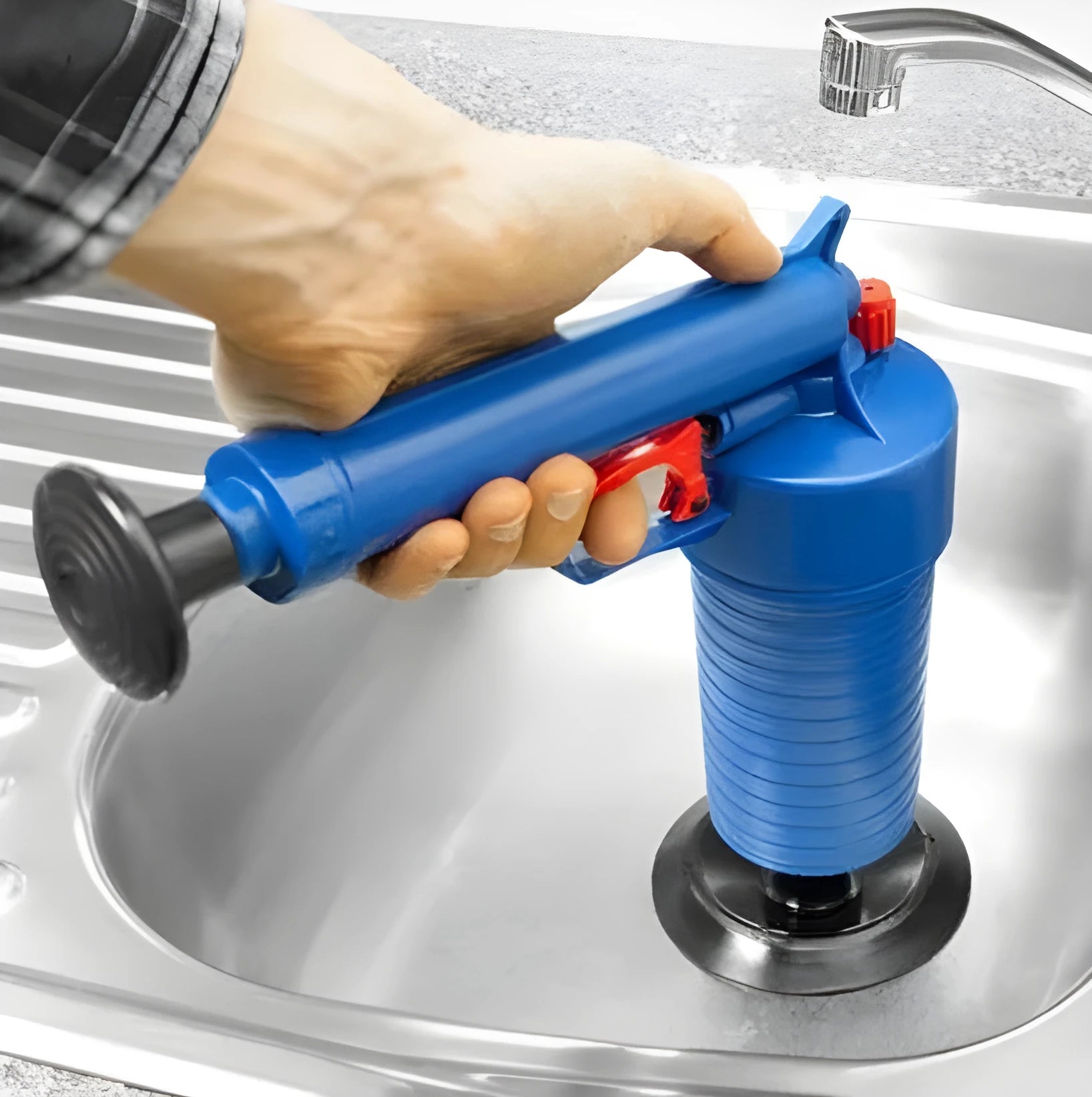 Plastic high-pressure drain blaster gun with four different sized suction cup adaptors for clearing blockages.