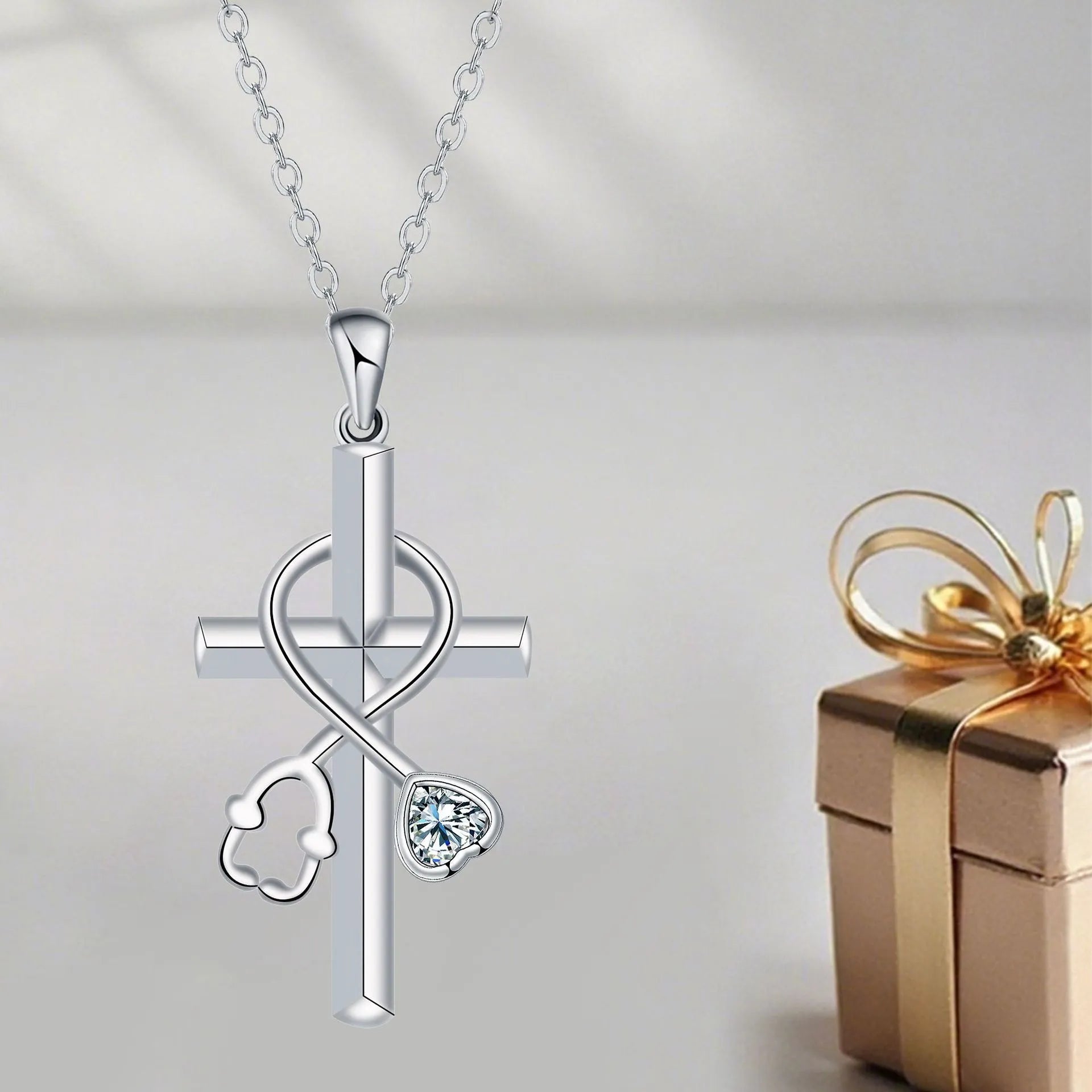 Women's stethoscope-shaped necklace with electroplated copper pendant and cross chain