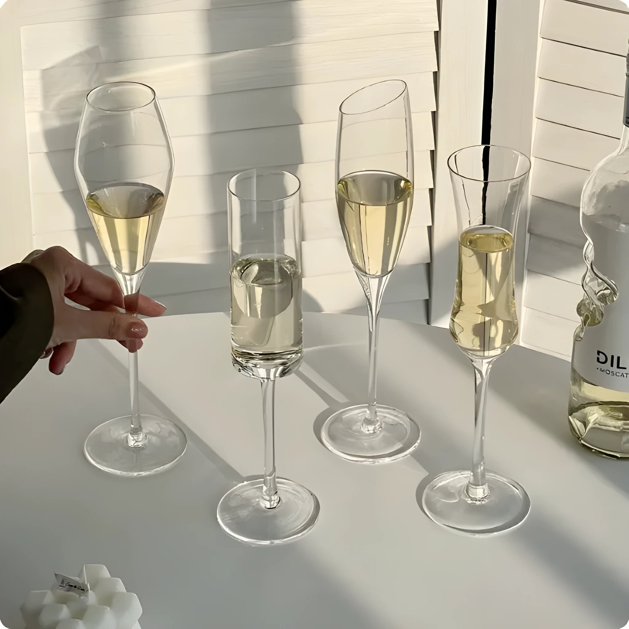 French goblet champagne glasses showing seven crystal design variations including tulip and flute styles