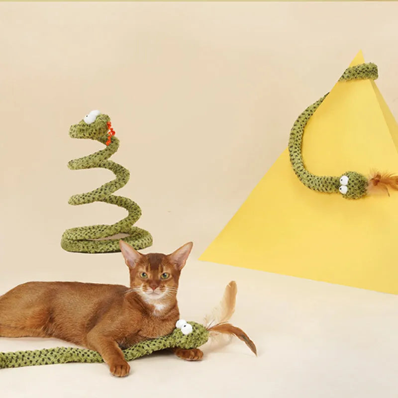 Green cat teasing stick with long pole showing artificial snake and feather attachments for interactive play