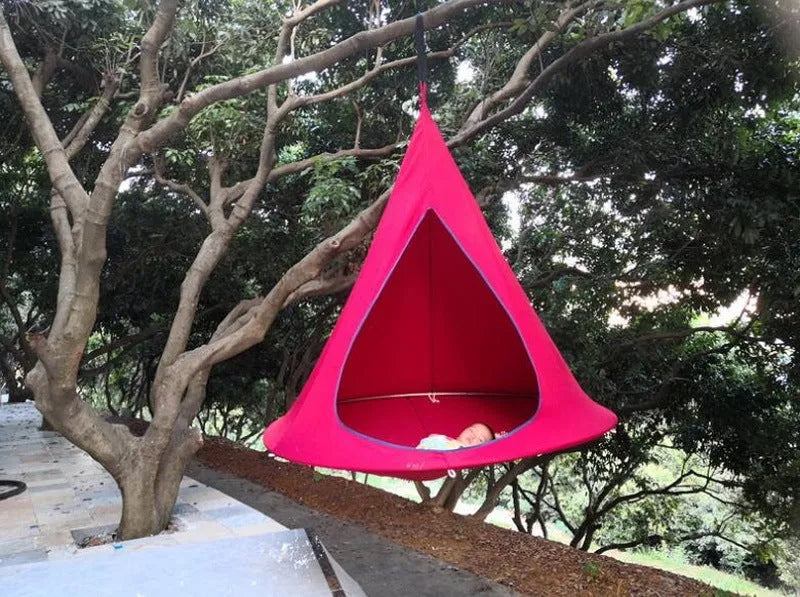Lightweight portable flying saucer hammock in green oxford cloth with metal frame for camping and outdoor leisure