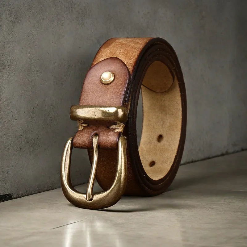 Men's black cattlehide leather casual belt with a copper pin buckle on a white background.