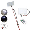 White LED fishing light panel on a tall telescopic pole with a wireless remote control