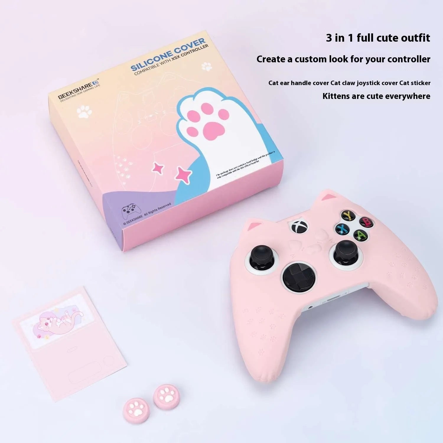 Cat ear silicone game controller cover in Pink with joystick caps and sticker on a white background