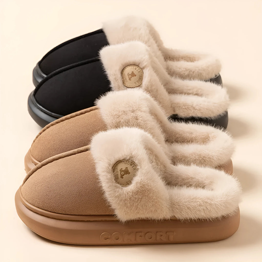 Plush fleece indoor slippers with PVC sole in five colour options showing car stitching detail