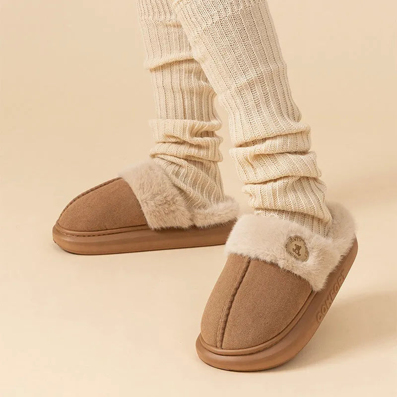Plush fleece indoor slippers with PVC sole in five colour options showing car stitching detail