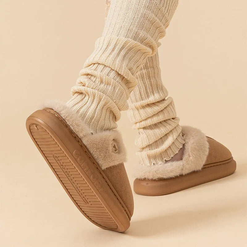 Plush fleece indoor slippers with PVC sole in five colour options showing car stitching detail