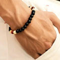 Natural stone beaded bracelet with lava stones for essential oils, unisex ethnic style.