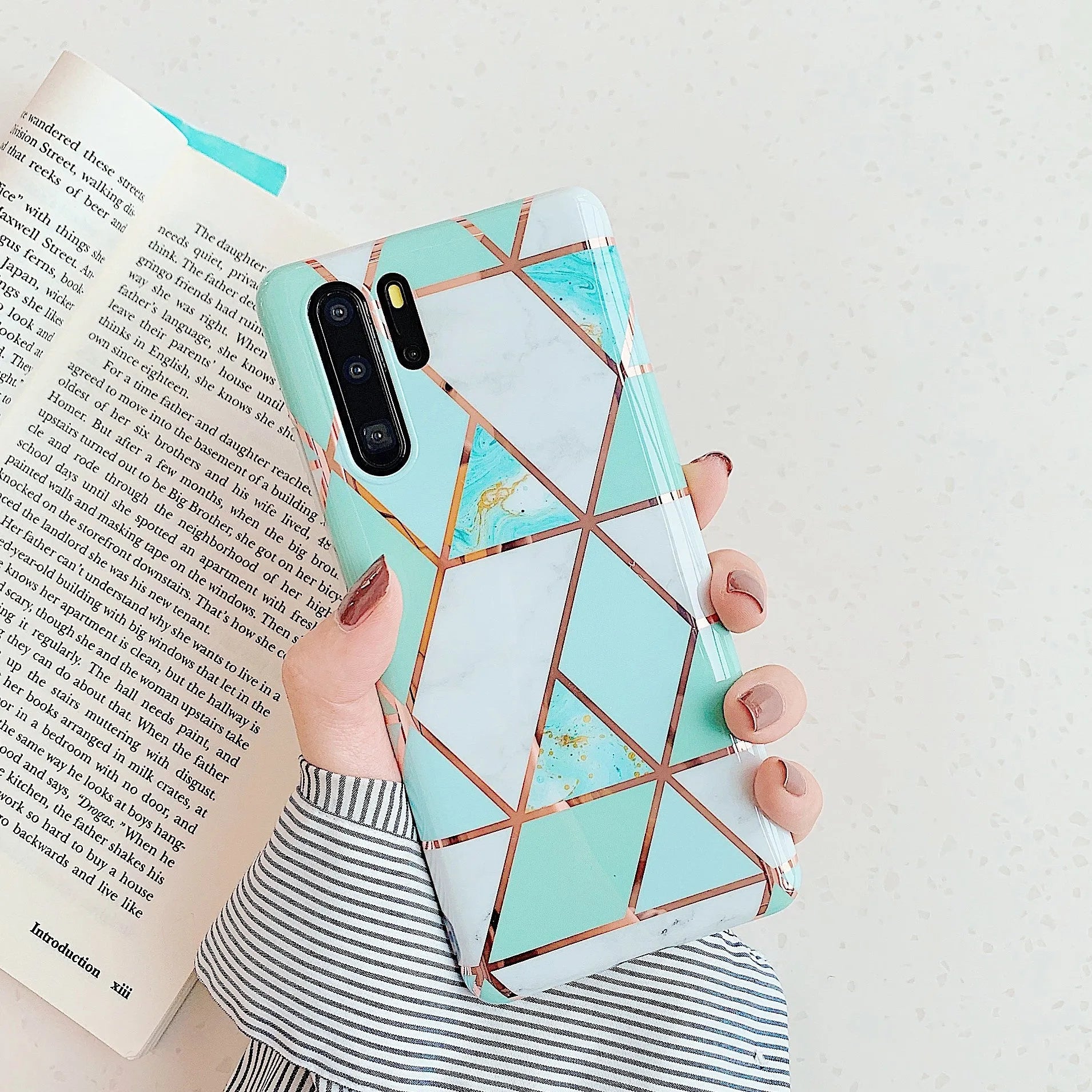 Electroplated marble finish TPU back cover case for Huawei and Samsung smartphones in multiple colours.