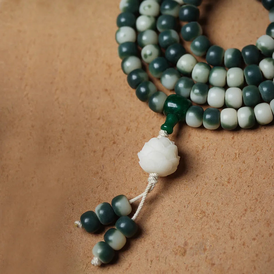 Lotus White Jade Bodhi root bracelet with floating flowers pattern on 8 × 10mm beads