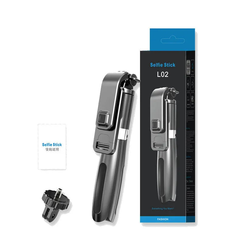 Extended black Bluetooth selfie stick with phone attached, showing remote control and folded tripod legs.