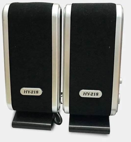 Compact black mini USB stereo speaker for notebook and desktop computers.