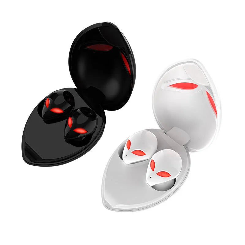 Creative Outer T8 Starman Alien design Bluetooth earbuds with red lighting in charging case.
