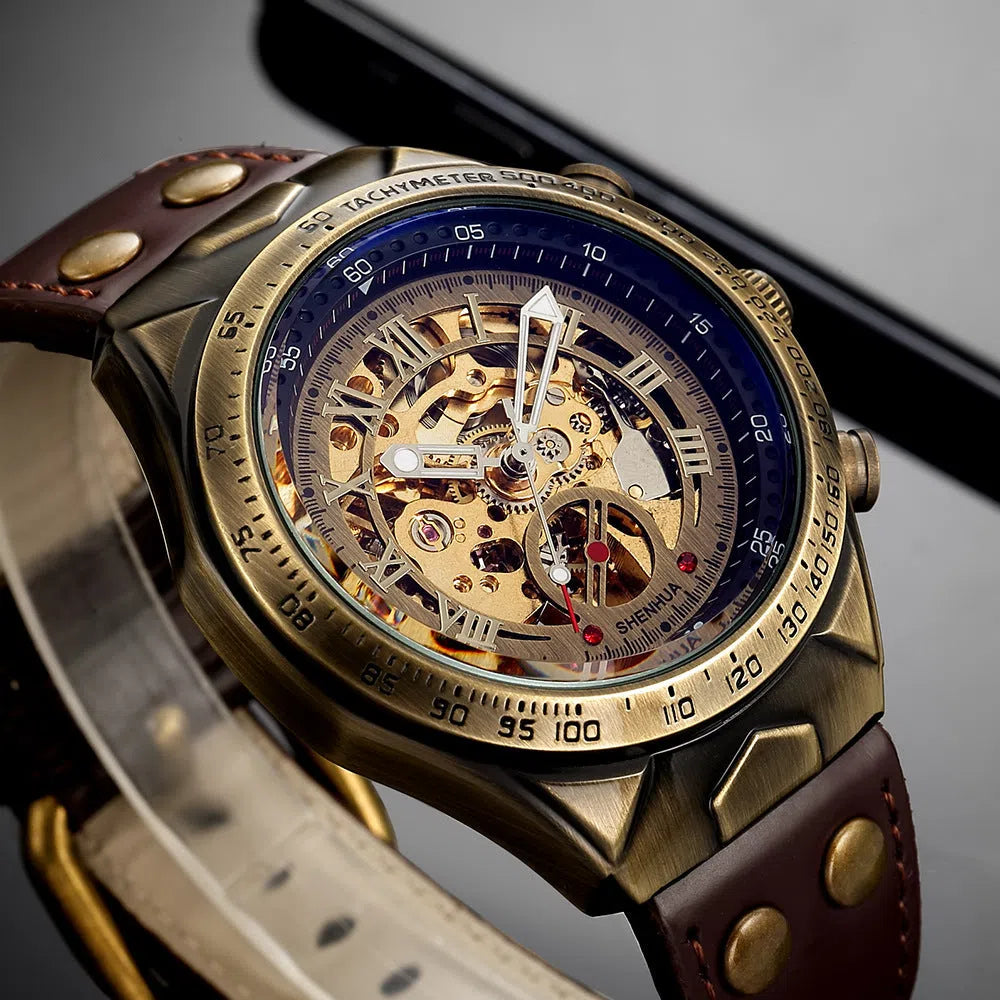 Men's automatic mechanical watch with hollowed-out round dial, 42mm alloy case, genuine leather strap, and transparent case back