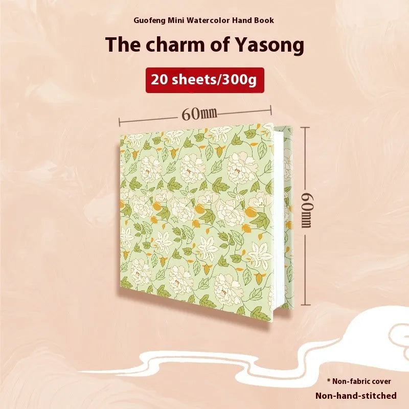 Feiluniao handmade fabric watercolour notebook in 185mm portable size, showing artistic cover design.