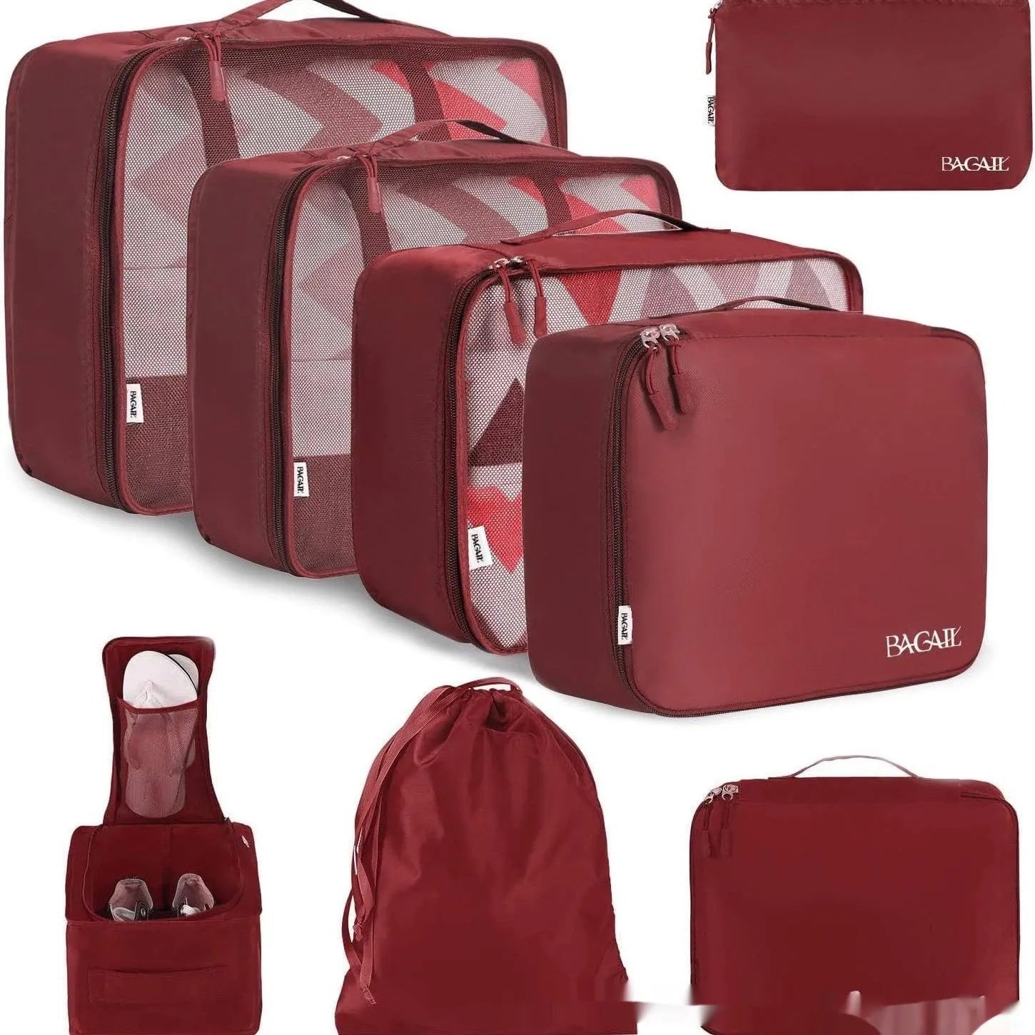 Eight cubic travel packing bags in various colours including beige, black, pink leopard print, and white pink stripes