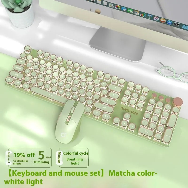 Matcha green mechanical gaming keyboard with multifunction knob on a desk