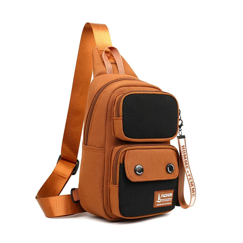 Black nylon crossbody bag with contrast colour accents and a polyester lining.