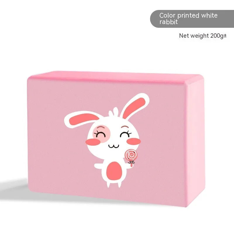 A high-density EVA yoga block in a choice of solid colours or printed designs, measuring 23cm by 15cm.