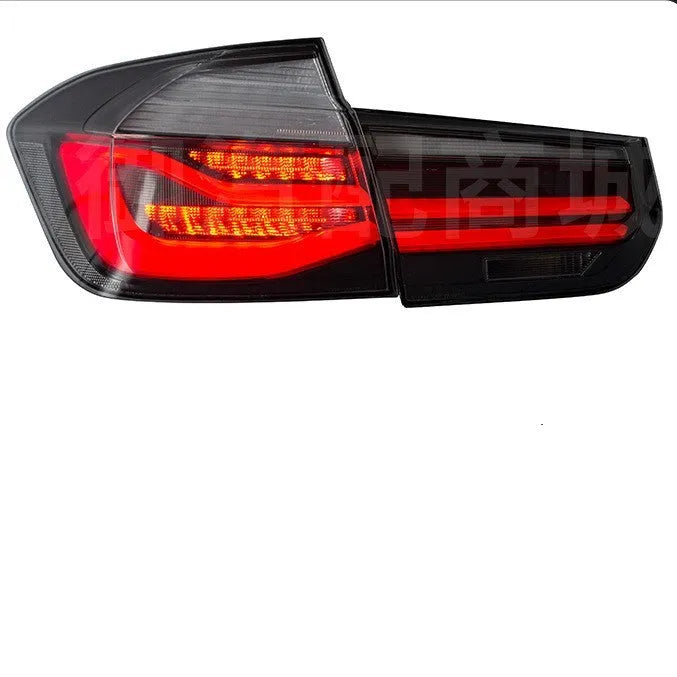 BMW 3 Series tail light assembly with LED streamer running light in smoked black or red finish.