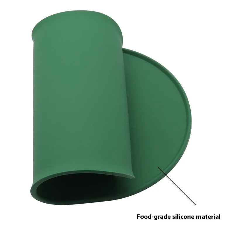 Silicone cat feeding placemat in beige showing food and water bowl placement