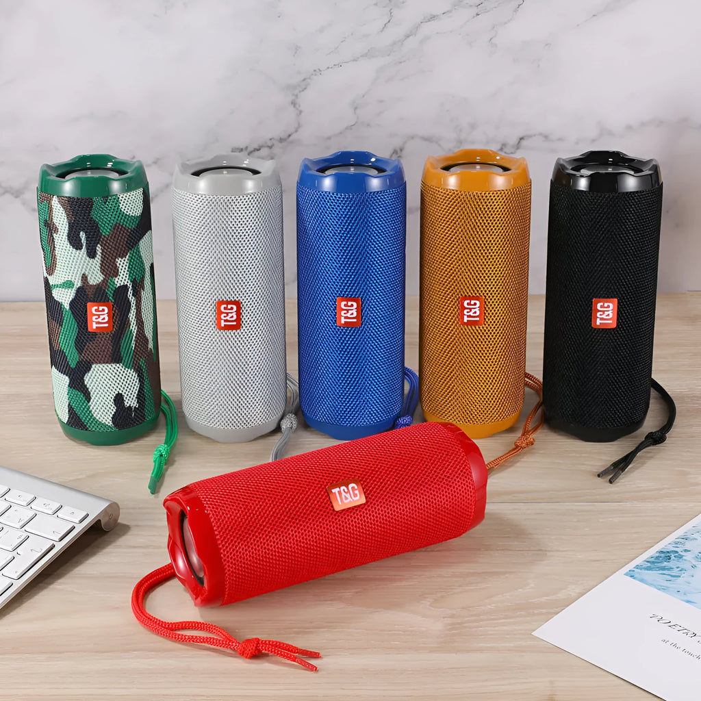 Blue portable Bluetooth speaker with a fabric card holder on the front