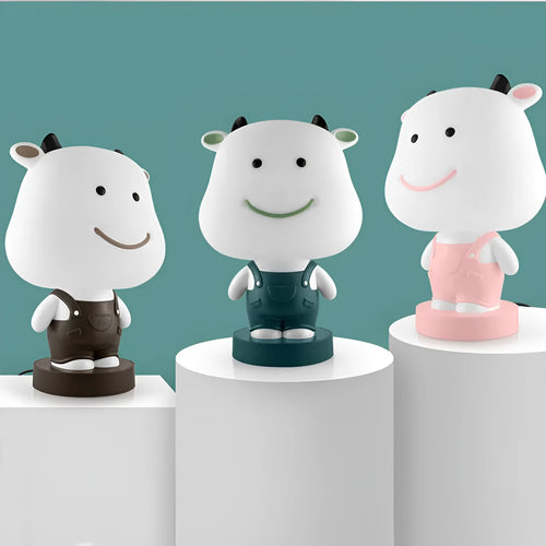 Animal cartoon table lamp with plastic shade and LED light in bear, cattle, rabbit, or tiger designs
