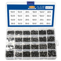 Black countersunk head machine screws for laptop repair in a box, showing cross-drive groove.