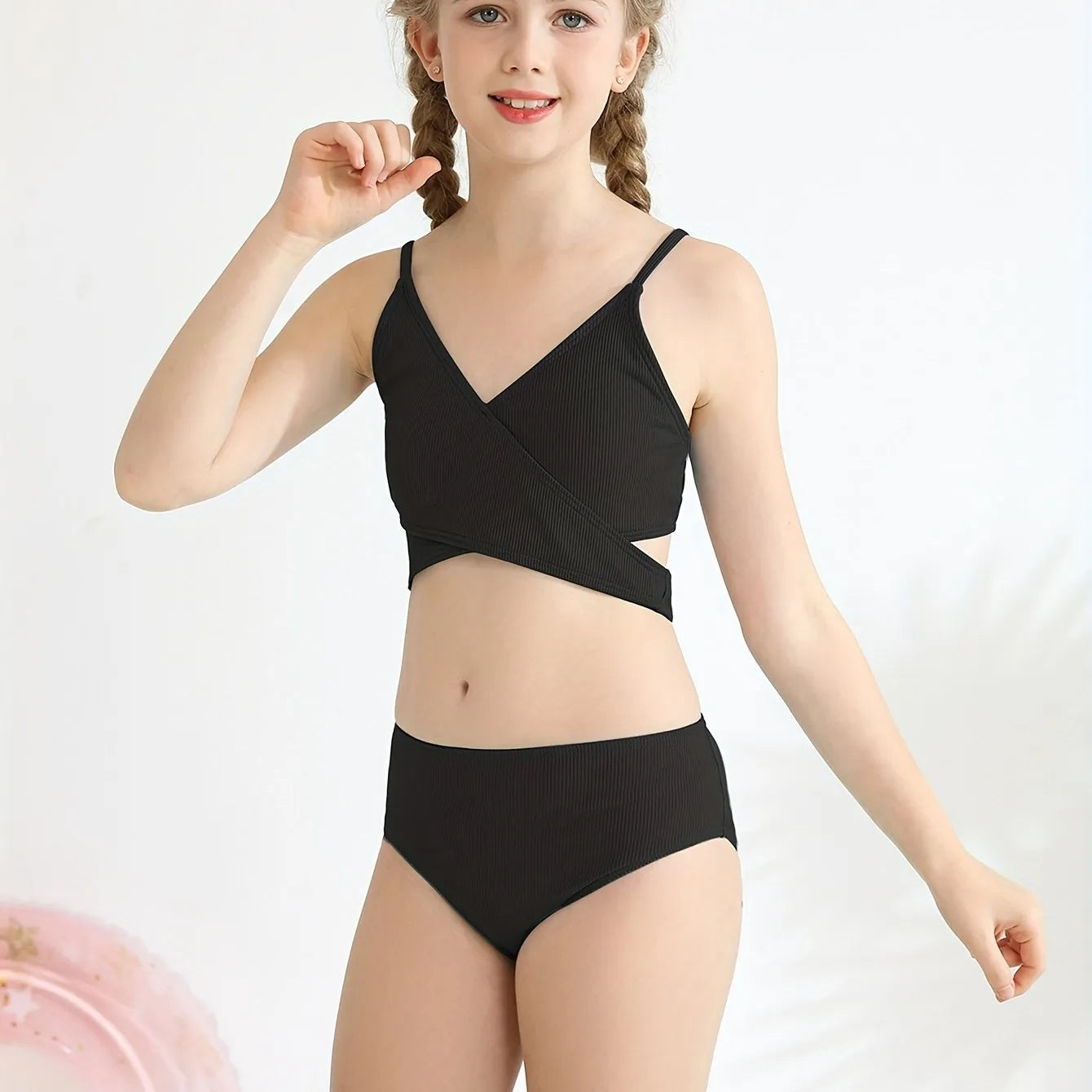 Girls two-piece criss-cross swimsuit set in blue green with polypropylene fabric
