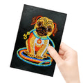 Black A5 diamond painting notebook, 142x207mm, with 50 blank pages open.