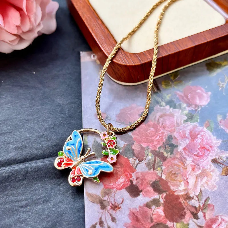 Vintage metal butterfly and petal stud earrings and pendant necklace set for women